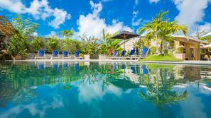 Outdoor pool, pool umbrellas, pool loungers