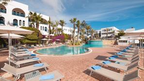 Outdoor pool, open 9:00 AM to 5:00 PM, pool umbrellas, pool loungers