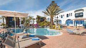 Outdoor pool, open 9:00 AM to 5:00 PM, pool umbrellas, pool loungers