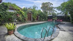Outdoor pool, pool umbrellas, pool loungers