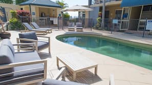 Outdoor pool, open 8:00 AM to 9:00 PM, pool umbrellas, pool loungers