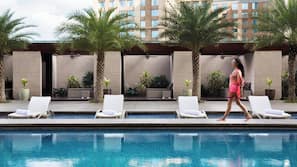 Outdoor pool, open 6:00 AM to 7:00 PM, pool umbrellas, pool loungers
