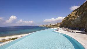 Outdoor pool, pool umbrellas, sun loungers