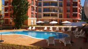 Outdoor pool, pool umbrellas, pool loungers
