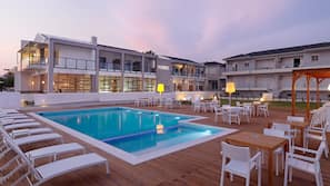 Outdoor pool, open 10 AM to 7 PM, pool umbrellas, sun loungers