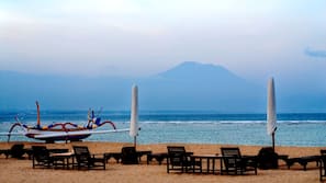 On the beach, white sand, free beach cabanas, sun-loungers