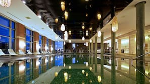 Indoor pool, outdoor pool, pool umbrellas, pool loungers