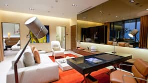 55-inch flat-screen TV with cable channels, pay movies
