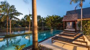 Outdoor pool, pool umbrellas, pool loungers