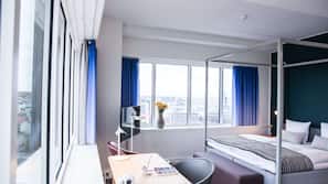 Luxe beddengoed, een kluis op de kamer, individueel gedecoreerd