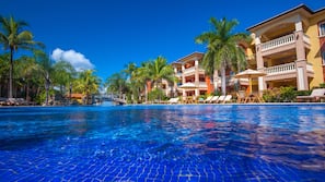 Outdoor pool, pool umbrellas, sun loungers