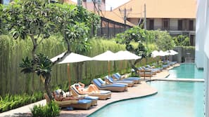 Outdoor pool, pool umbrellas, pool loungers