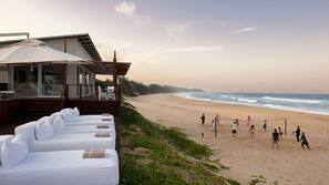 Private beach, white sand, beach towels, scuba diving