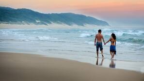 Private beach, white sand, beach towels, scuba diving