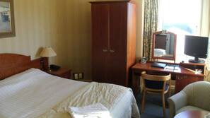Premium bedding, blackout curtains, iron/ironing board, free WiFi