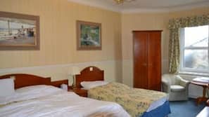 Premium bedding, blackout curtains, iron/ironing board, free WiFi