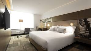Ropa de cama de alta calidad, minibar, caja fuerte y escritorio