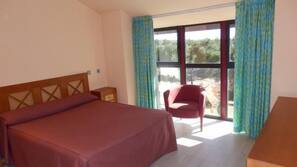 In-room safe, blackout curtains, iron/ironing board