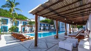 Outdoor pool, pool umbrellas, sun loungers