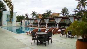 Outdoor pool, pool umbrellas, sun loungers