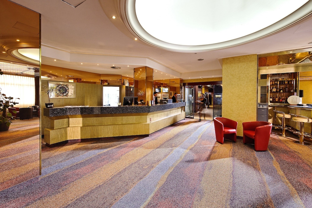 Foto - becozy Au Parc Retro Edition Self-Check-In Rooms & Studios Fribourg