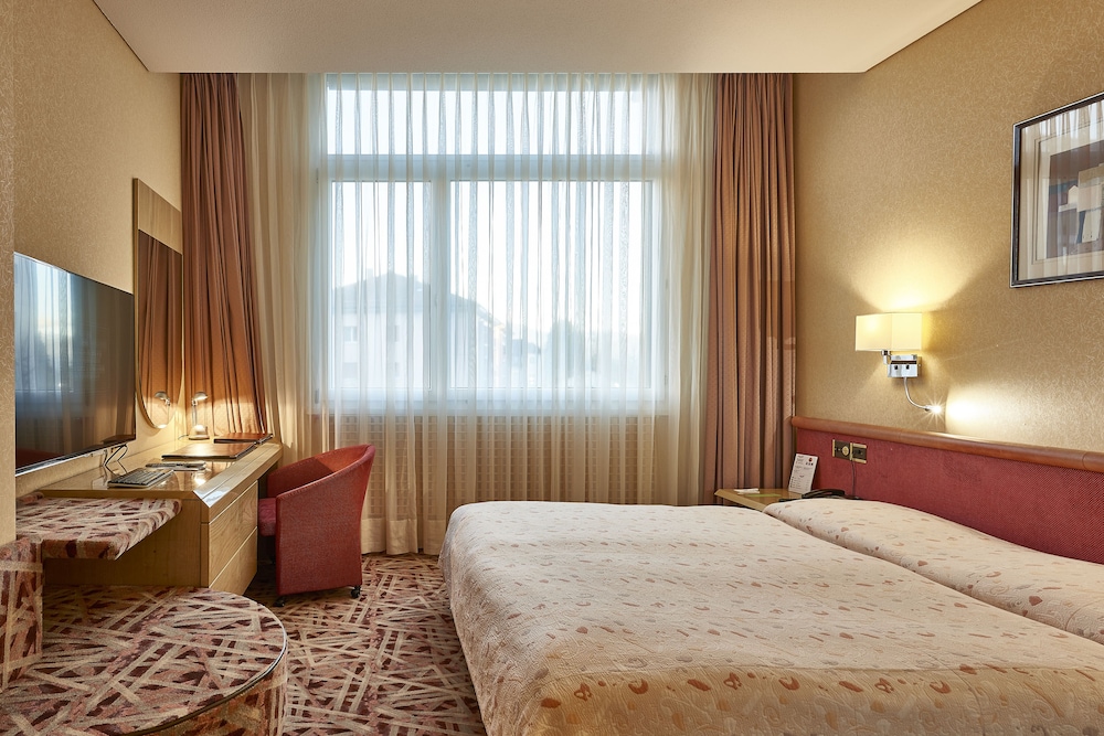 Foto - becozy Au Parc Retro Edition Self-Check-In Rooms & Studios Fribourg