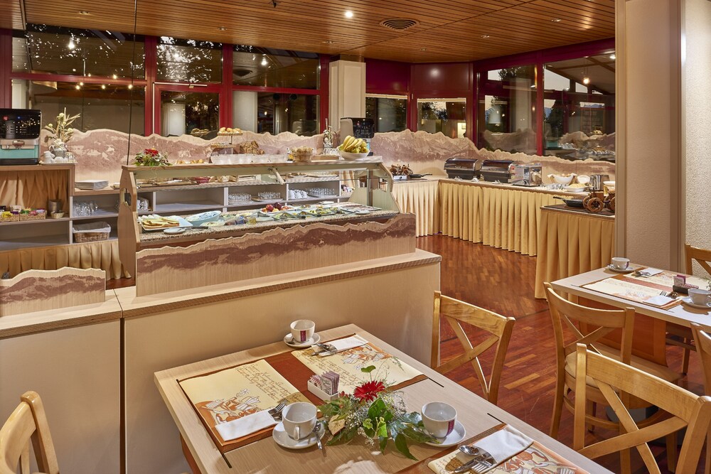 Foto - becozy Au Parc Retro Edition Self-Check-In Rooms & Studios Fribourg