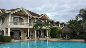 Outdoor pool, pool umbrellas, pool loungers