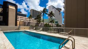 Outdoor pool, pool umbrellas, pool loungers