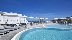 Seasonal outdoor pool, open 9:30 AM to 7:30 PM, sun loungers