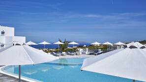 Seasonal outdoor pool, open 9:30 AM to 7:30 PM, sun loungers