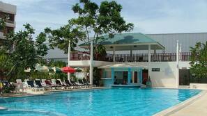 Outdoor pool, pool umbrellas, pool loungers