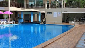 Outdoor pool, pool umbrellas, pool loungers