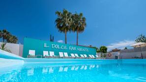 Outdoor pool, pool umbrellas, pool loungers