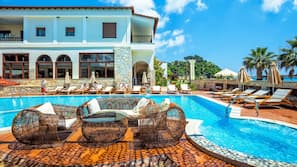 Outdoor pool, pool umbrellas, pool loungers