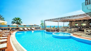 Outdoor pool, pool umbrellas, pool loungers