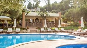 Outdoor pool, pool umbrellas, pool loungers