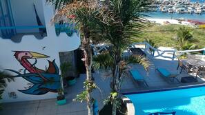 On the beach, sun-loungers, beach umbrellas, beach towels