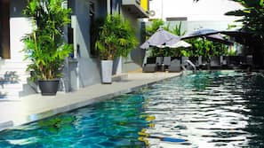Outdoor pool, open 7 AM to 9 PM, sun loungers