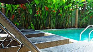 Outdoor pool, open 7 AM to 9 PM, sun loungers