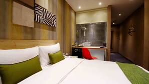 Frette Italian sheets, premium bedding, Select Comfort beds, minibar