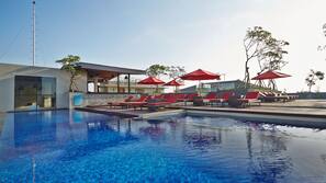 Outdoor pool, pool umbrellas, pool loungers