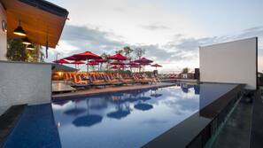 Outdoor pool, pool umbrellas, pool loungers
