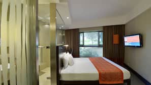 Down comforters, memory foam beds, minibar, in-room safe