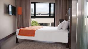 Down comforters, memory foam beds, minibar, in-room safe