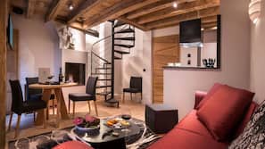 Flat-screen TV, fireplace, computer, pay movies