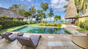Outdoor pool, pool umbrellas, sun loungers