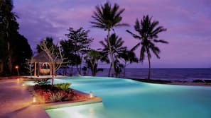 Outdoor pool, pool umbrellas, sun loungers