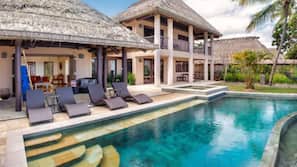Outdoor pool, pool umbrellas, sun loungers
