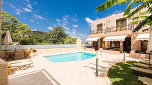 Seasonal outdoor pool, pool umbrellas, pool loungers